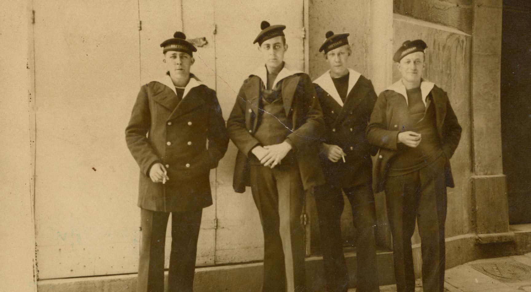 French Navy sailors wearing Breton Le Glazik peacoats aboard the ship Bretagne